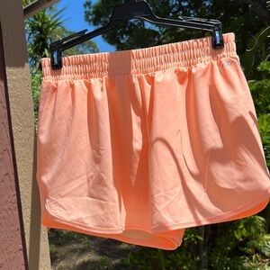 DSG Girls peach colored running shorts. Never worn, but washed once